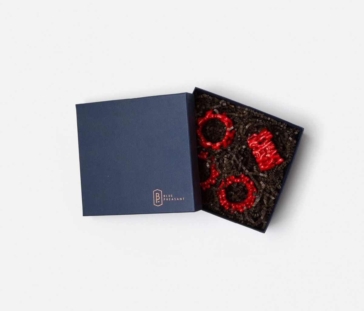 coral napkin rings in red, set of 4