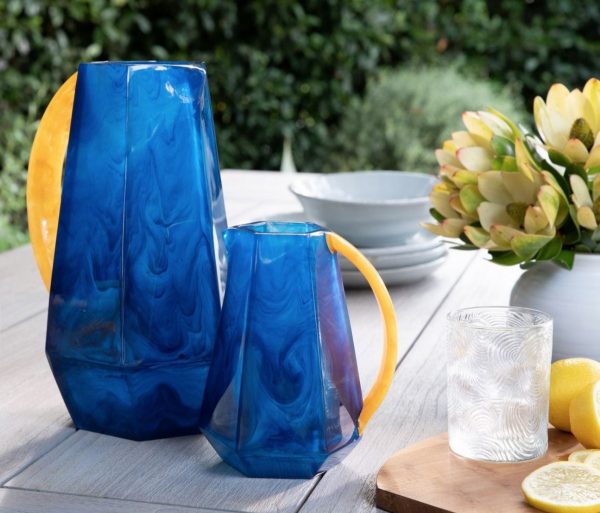 large and small resin pitcher in cobalt and marigold